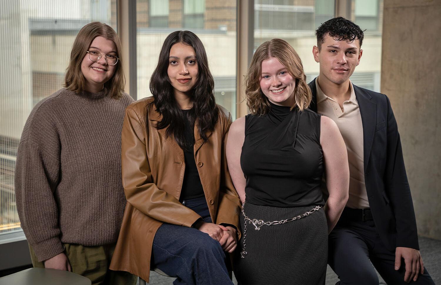 Hazel Avery, Michelle Flores, Natilee Strey, Graeme Coté from Columbia College Chicago post together for a team photo.